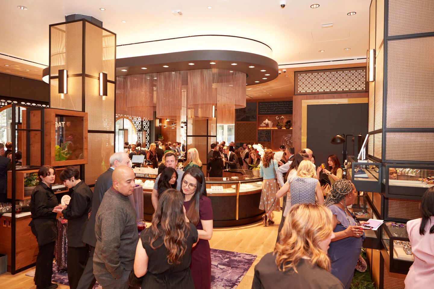 Crowds gather inside the new Ben Bridge store location to celebrate the grand opening. 